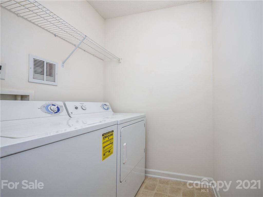 8178 Rudolph Road Charlotte, NC 28216 - Photo 12 of 20 a utility room with dryer and washer