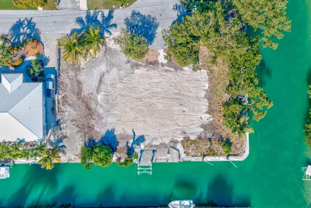 an aerial view of a house with a garden