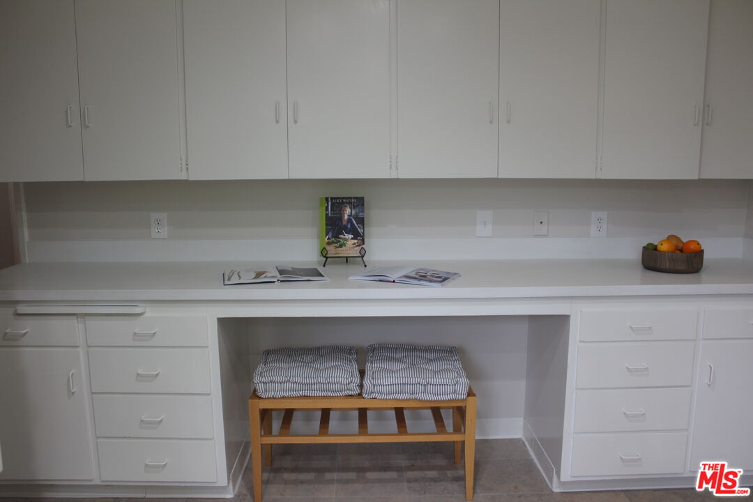 282 Wigmore Drive Pasadena, CA 91105 - Photo 3 of 15 a kitchen with a sink a stove and cabinets