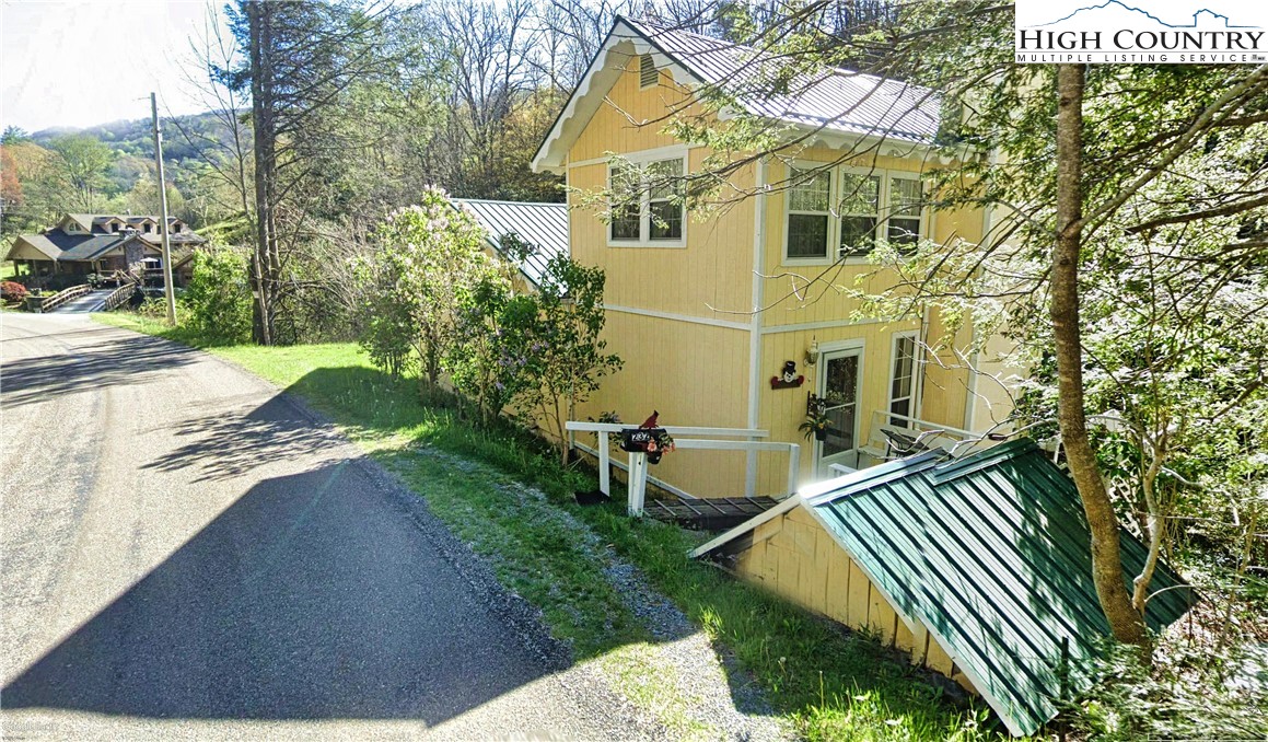 a view of swimming pool with a patio