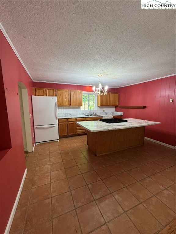 232 Cole Hollow Road Newland, NC 28657 - Photo 13 of 31 a kitchen with stainless steel appliances a sink stove and cabinets