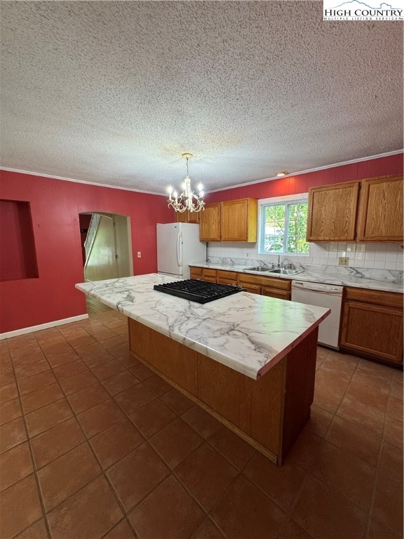 232 Cole Hollow Road Newland, NC 28657 - Photo 14 of 31 a kitchen with stainless steel appliances granite countertop a stove a sink and a microwave