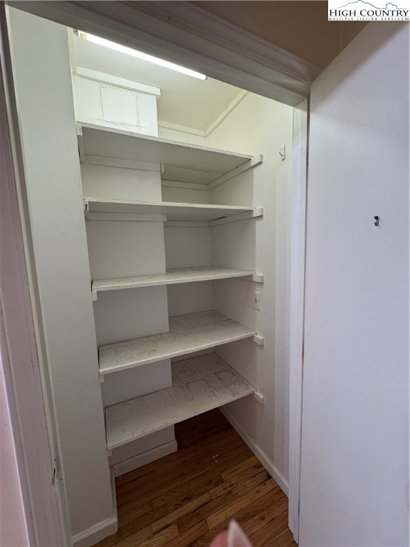 232 Cole Hollow Road Newland, NC 28657 - Photo 16 of 31 a view of walk in closet with empty racks
