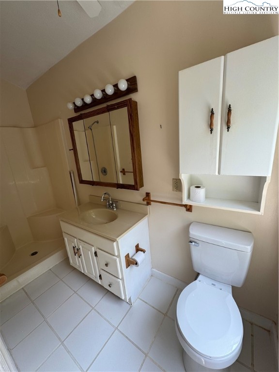 232 Cole Hollow Road Newland, NC 28657 - Photo 25 of 31 a bathroom with a toilet sink and mirror