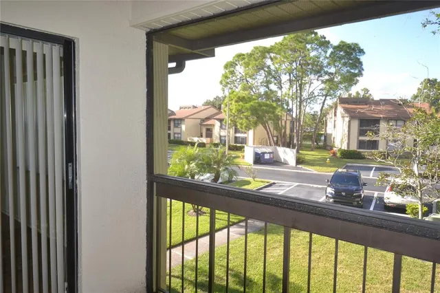 a view of a street from a balcony