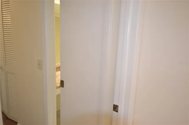 a view of a bathroom from a hallway