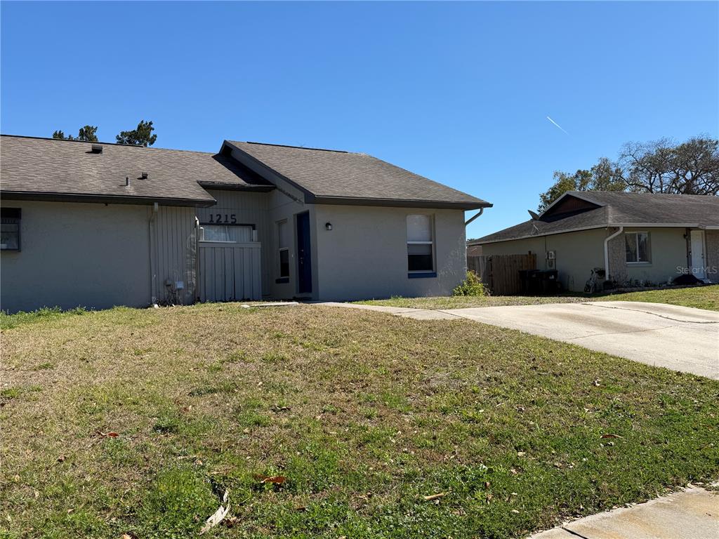 1215 Ravida Circle Orlando, FL 32825 - Photo 22 of 22 a house view with a backyard space
