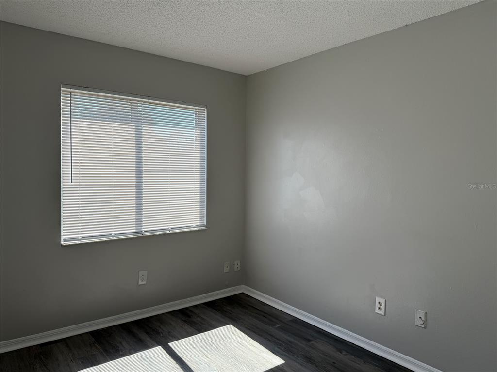 1215 Ravida Circle Orlando, FL 32825 - Photo 10 of 22 an empty room with a window