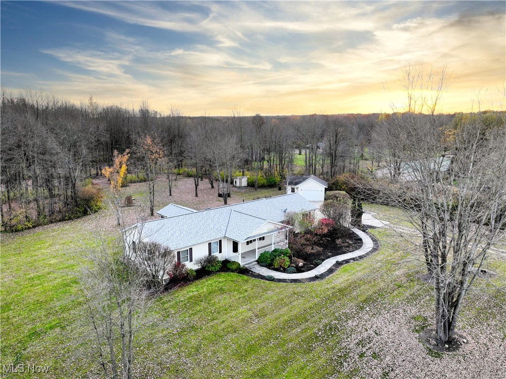 17161 Burrows Road Thompson, OH 44086 - Photo 48 of 48 View of aerial view at dusk