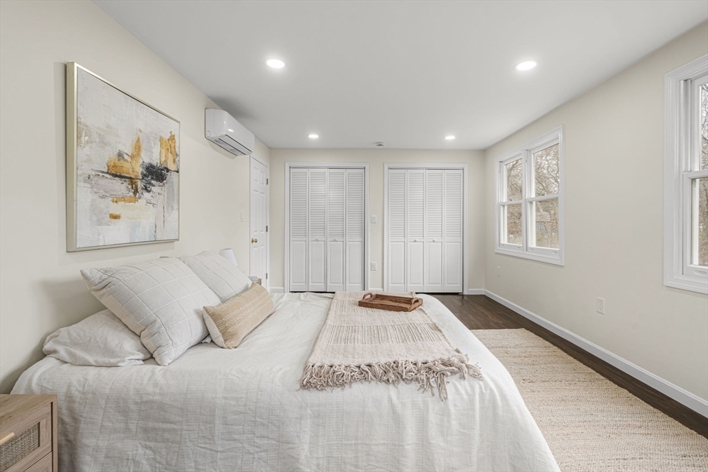 7 Old North Road Hudson, MA 01749 - Photo 12 of 39 a spacious bedroom with a large bed and a window