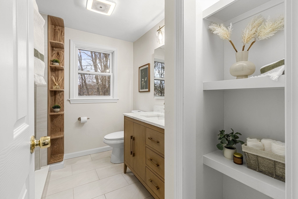 7 Old North Road Hudson, MA 01749 - Photo 13 of 39 a bathroom with a sink a toilet and shower