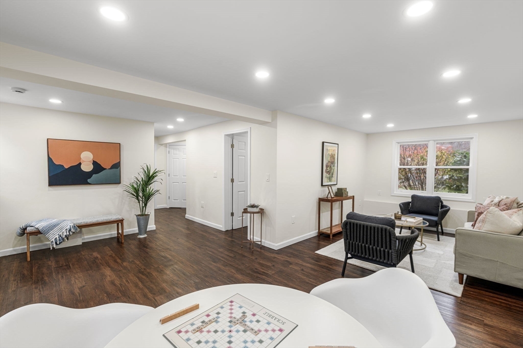 7 Old North Road Hudson, MA 01749 - Photo 18 of 39 a living room with furniture and a flat screen tv