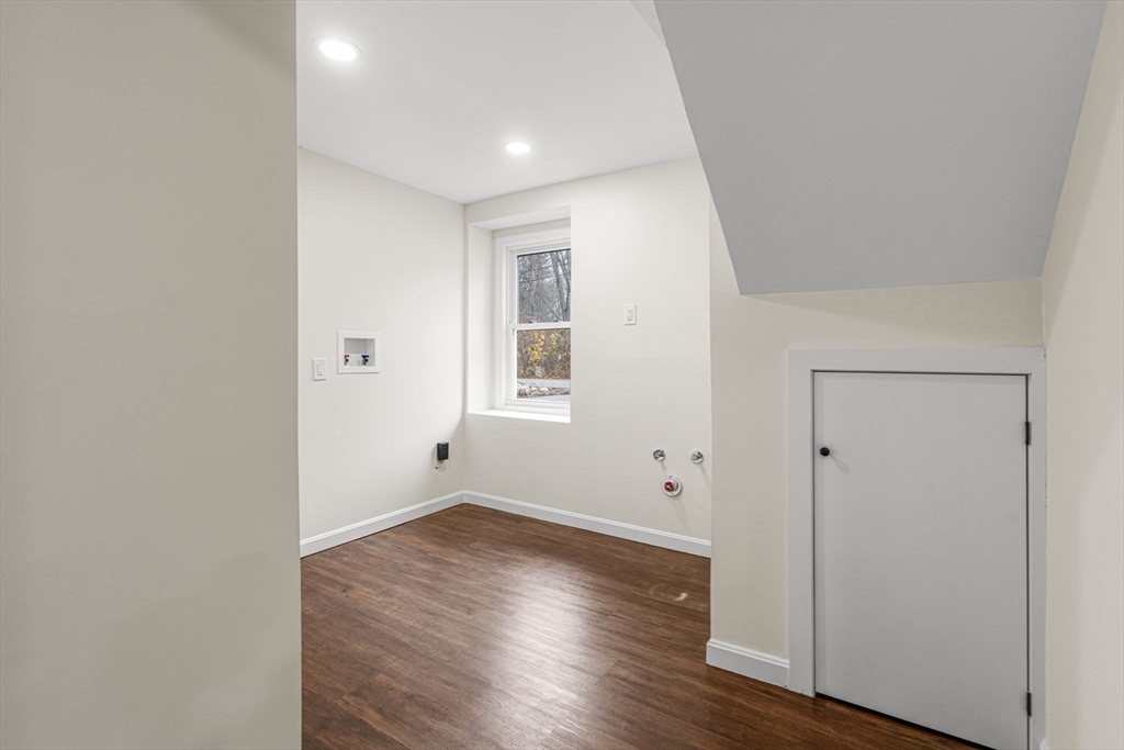 7 Old North Road Hudson, MA 01749 - Photo 29 of 39 wooden floor in an empty room with a window