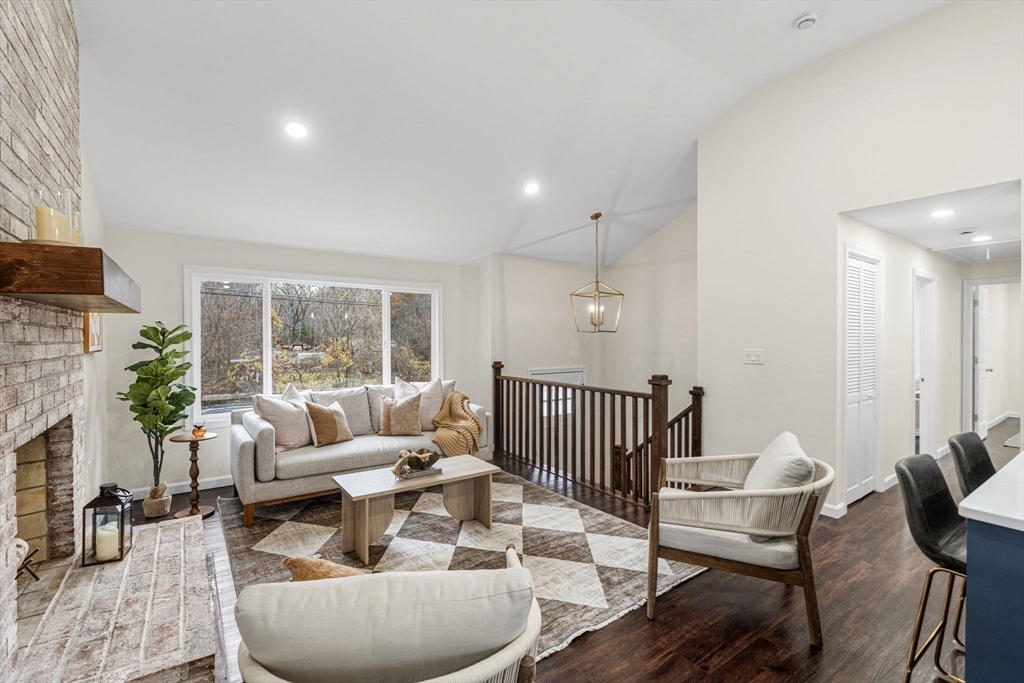 7 Old North Road Hudson, MA 01749 - Photo 9 of 39 a living room with furniture and a potted plant
