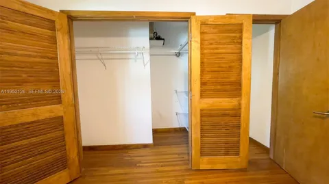 a view of front door and wooden door