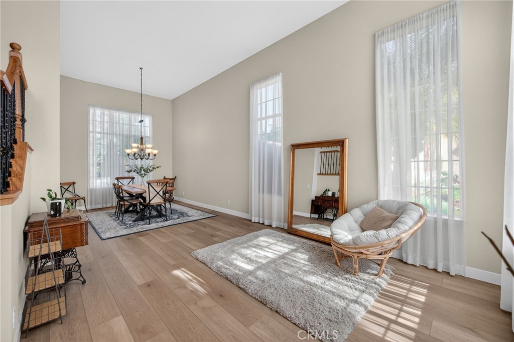 28322 Corte Ocaso Temecula, CA 92592 - Photo 15 of 75 a living room with furniture and a large window