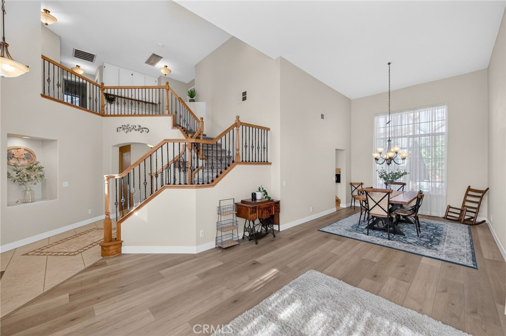 28322 Corte Ocaso Temecula, CA 92592 - Photo 16 of 75 a living room with furniture and wooden floor