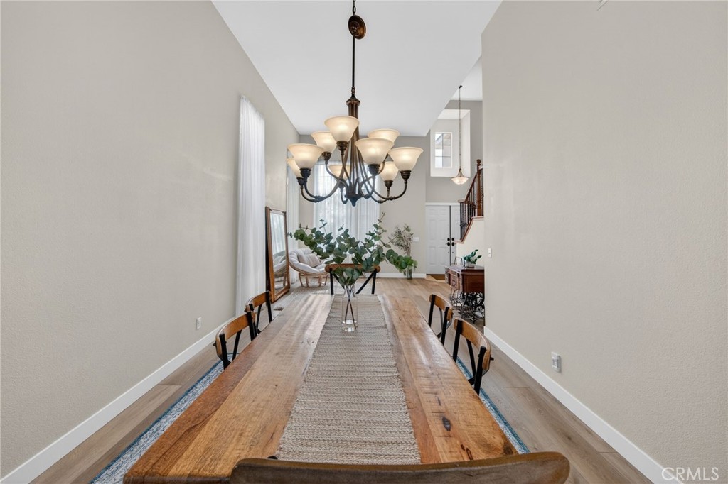 28322 Corte Ocaso Temecula, CA 92592 - Photo 20 of 75 a view of a hallway with wooden floor