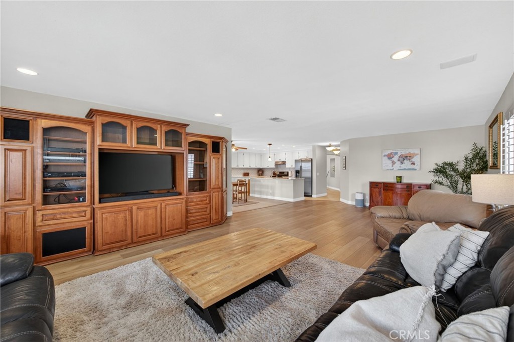 28322 Corte Ocaso Temecula, CA 92592 - Photo 26 of 75 a living room with furniture and a flat screen tv