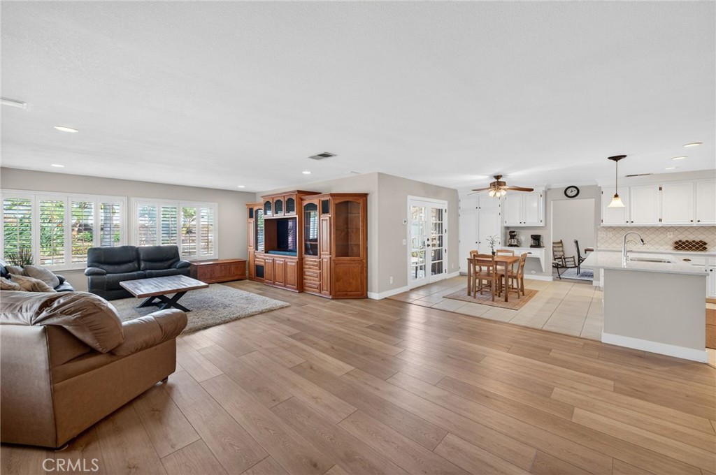 28322 Corte Ocaso Temecula, CA 92592 - Photo 27 of 75 a living room with furniture and a wooden floor