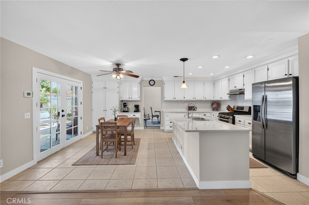 28322 Corte Ocaso Temecula, CA 92592 - Photo 31 of 75 a living room with stainless steel appliances furniture a dining table and kitchen view
