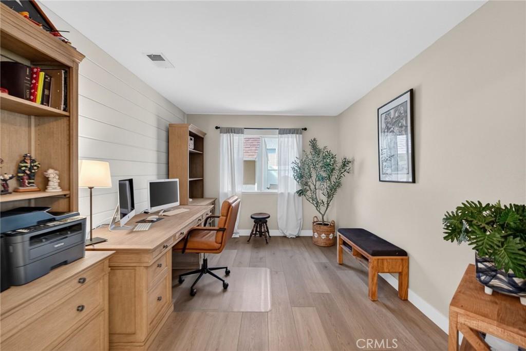 28322 Corte Ocaso Temecula, CA 92592 - Photo 36 of 75 a workspace with furniture window and wooden floor