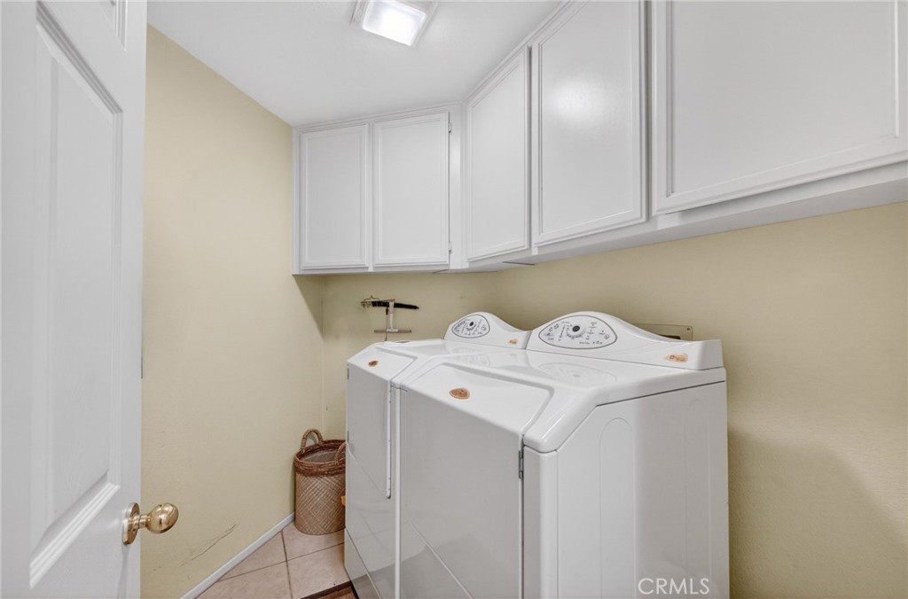 28322 Corte Ocaso Temecula, CA 92592 - Photo 37 of 75 a utility room with dryer and washer