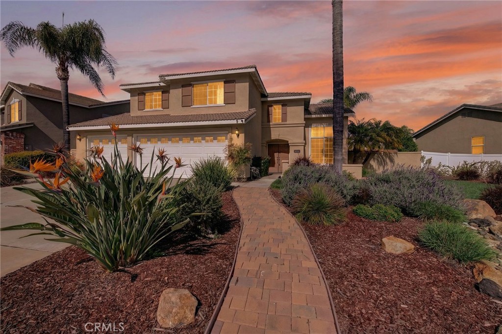 28322 Corte Ocaso Temecula, CA 92592 - Photo 4 of 75 a front view of a house with a yard