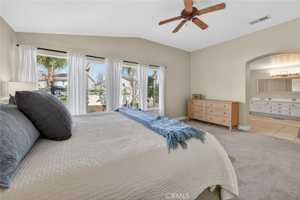 28322 Corte Ocaso Temecula, CA 92592 - Photo 45 of 75 a bedroom with a bed and window