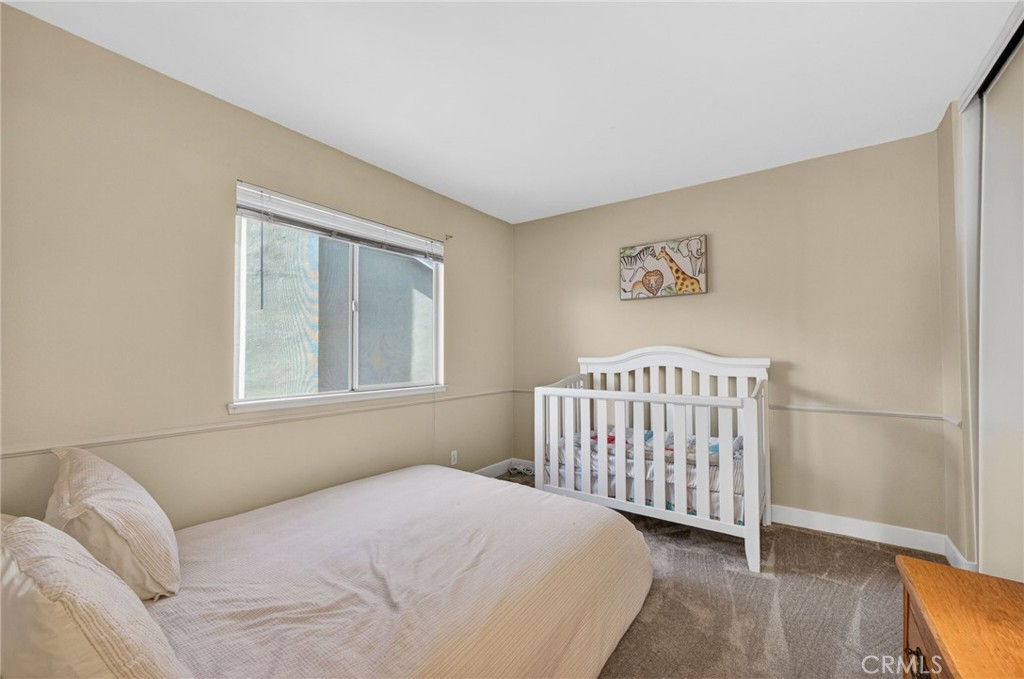 28322 Corte Ocaso Temecula, CA 92592 - Photo 56 of 75 a bedroom with a bed and a window