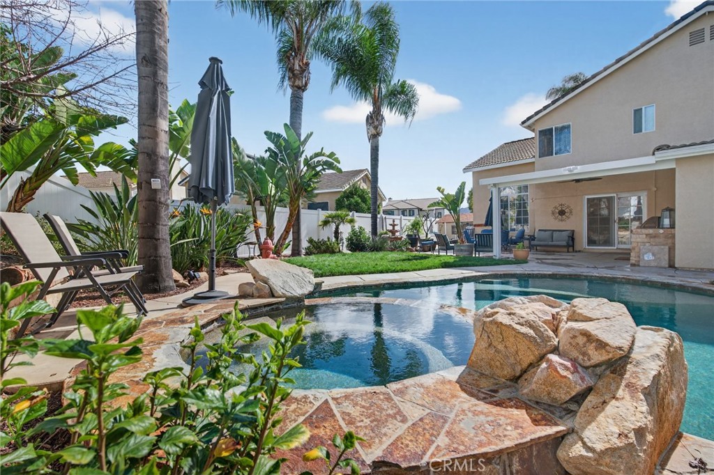 28322 Corte Ocaso Temecula, CA 92592 - Photo 62 of 75 a view of a swimming pool with a patio