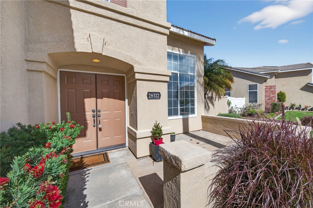 28322 Corte Ocaso Temecula, CA 92592 - Photo 8 of 75 a front view of a house with a yard