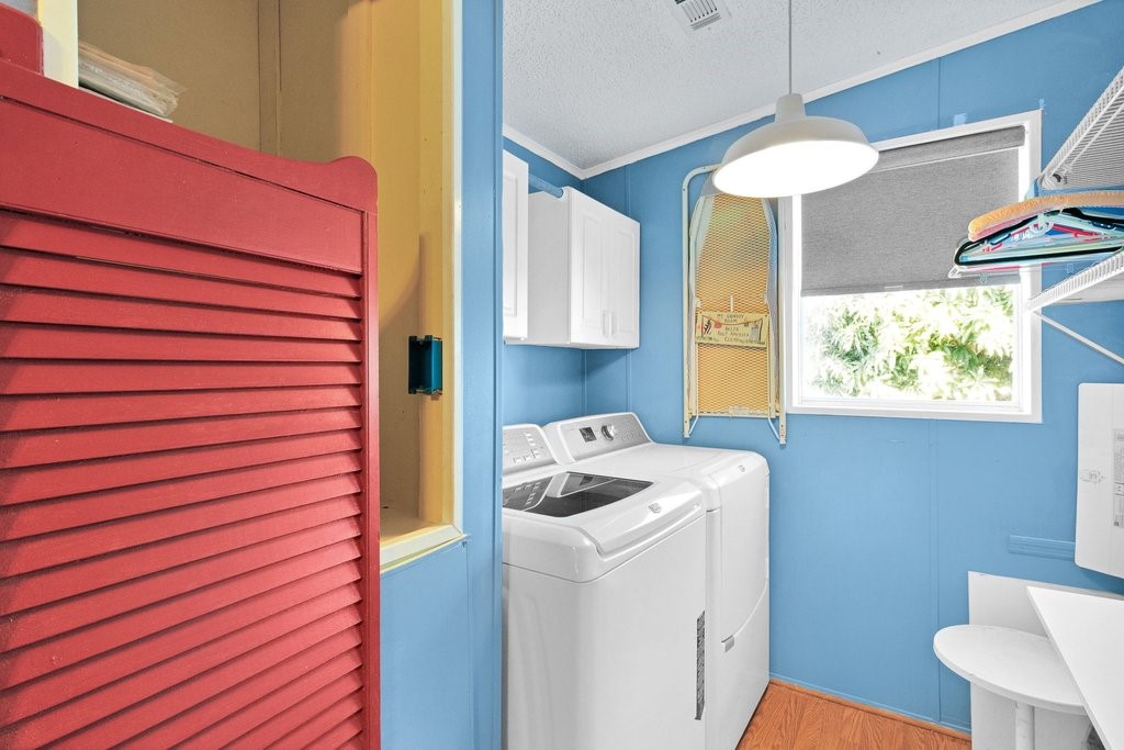 7605 Cedar Bark Road Sebastian, FL 32976 - Photo 25 of 34 a utility room with dryer and washer