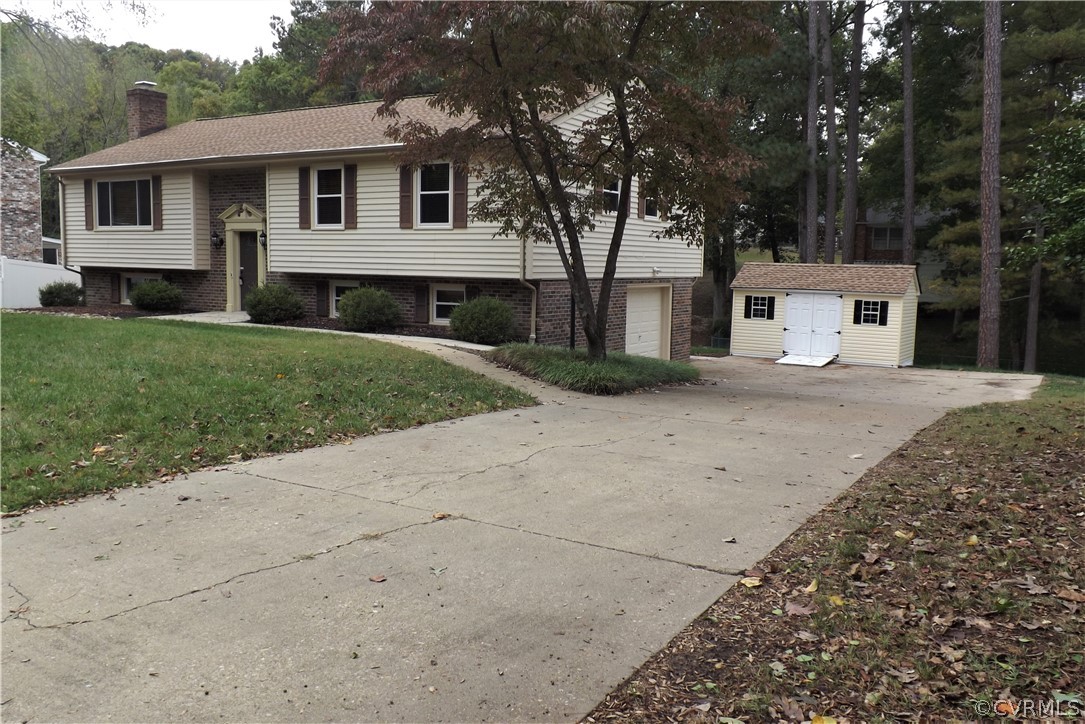 Beautifully Maintained Brick & Vinyl Home with new