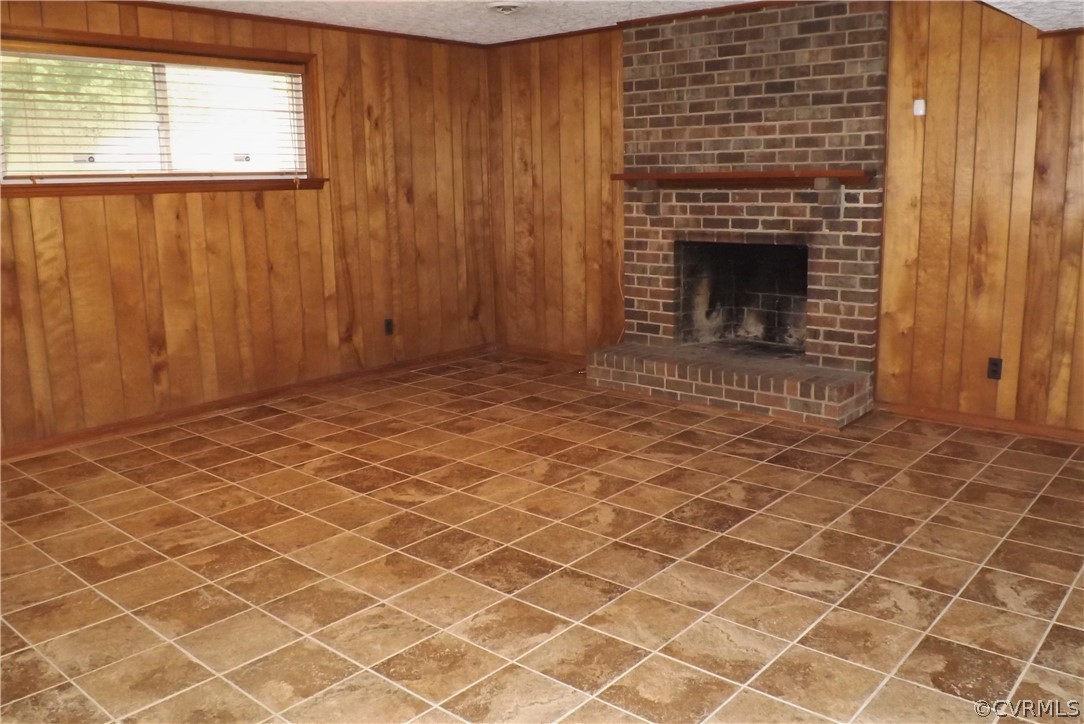 13104 Middlebrook Road Chester, VA 23831 - Photo 12 of 22 The Rec Room has lots of light, a brick raised hea
