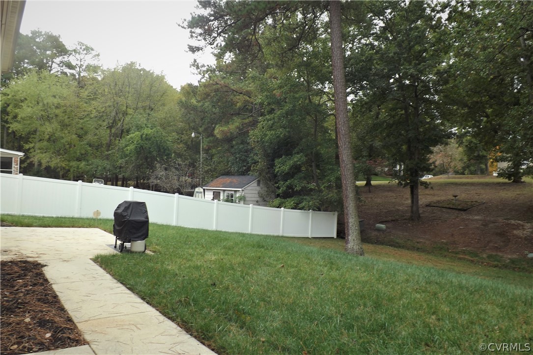 13104 Middlebrook Road Chester, VA 23831 - Photo 19 of 22 Concrete Sidewalk from driveway to patio. Privacy