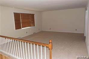 13104 Middlebrook Road Chester, VA 23831 - Photo 2 of 22 The 19x16 Living Room/Family Room has newer carpet