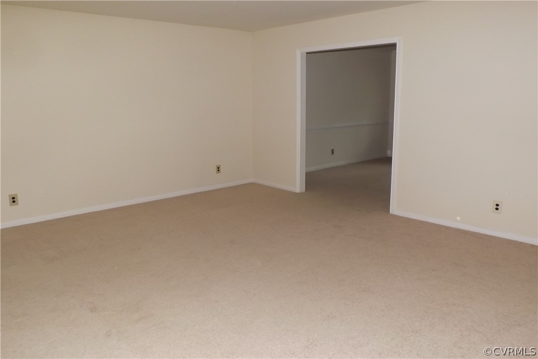 13104 Middlebrook Road Chester, VA 23831 - Photo 3 of 22 Living Room/Family Room to Dining Room