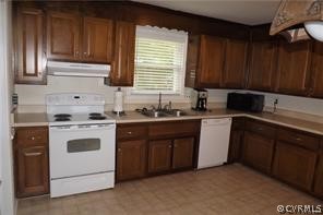 13104 Middlebrook Road Chester, VA 23831 - Photo 5 of 22 The eat-in kitchen offers plenty of cabinet and co