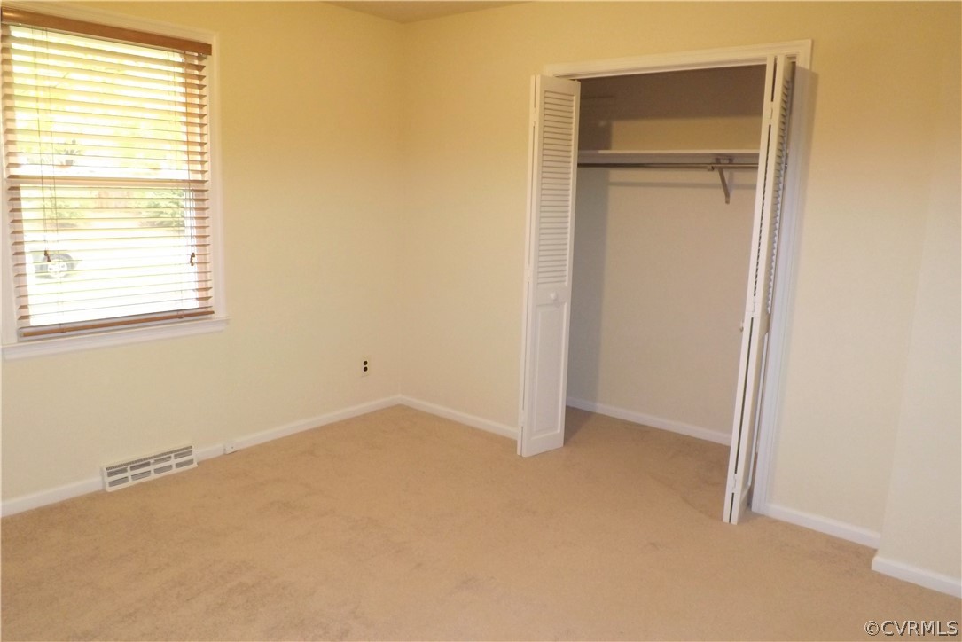 13104 Middlebrook Road Chester, VA 23831 - Photo 10 of 22 The Upper Level Bedroom is light and bright with a