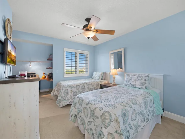 a room with furniture and a flat screen tv