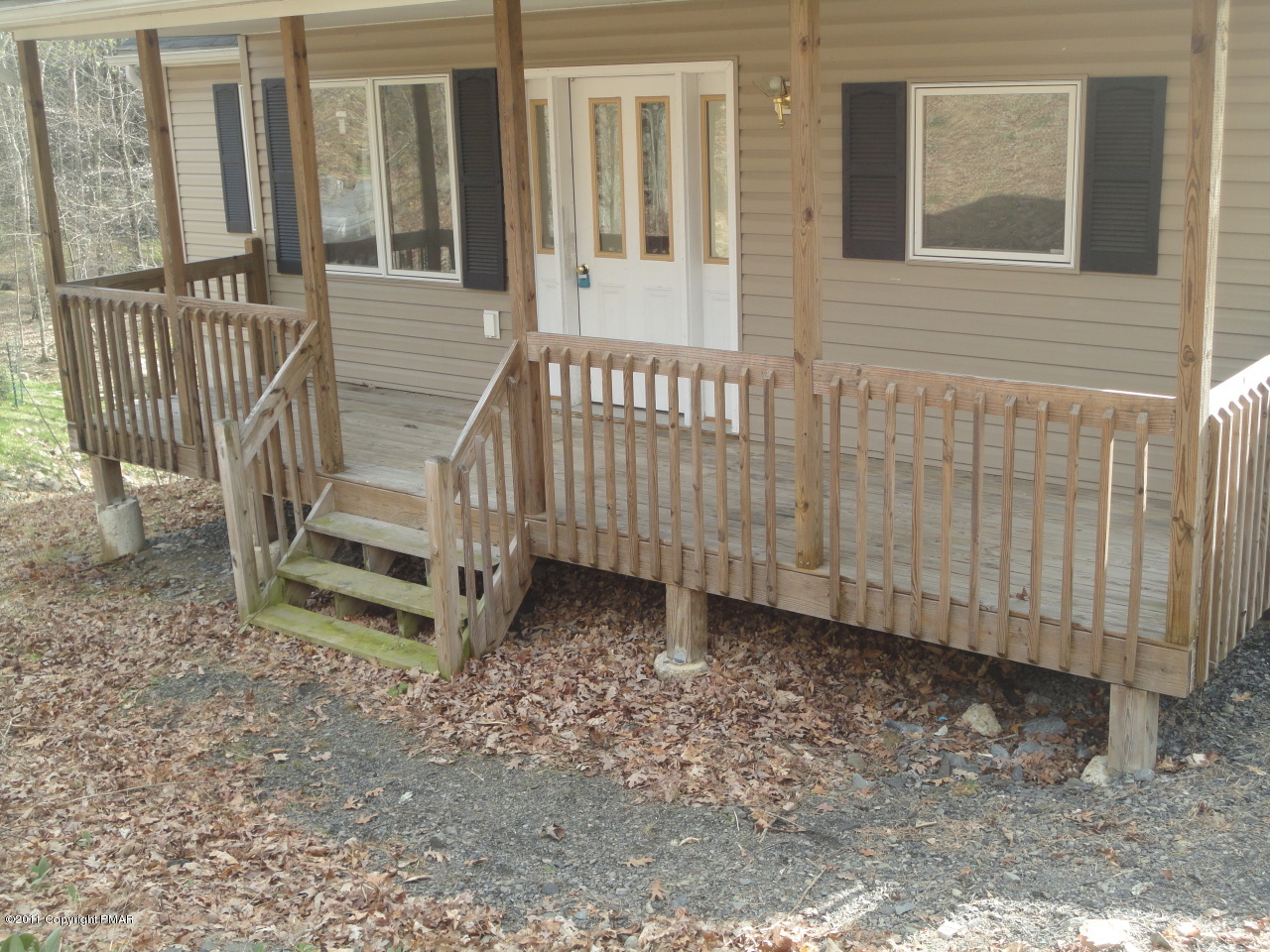 979 Canterbury Road Bushkill, PA 18324 - Photo 5 of 15 a view of wooden house with wooden fence