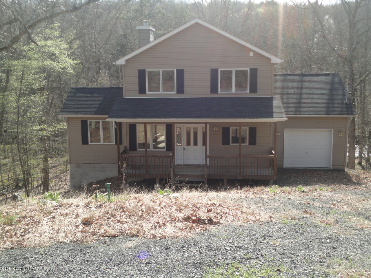 979 Canterbury Road Bushkill, PA 18324 - Photo 8 of 15 a front view of a house with a yard