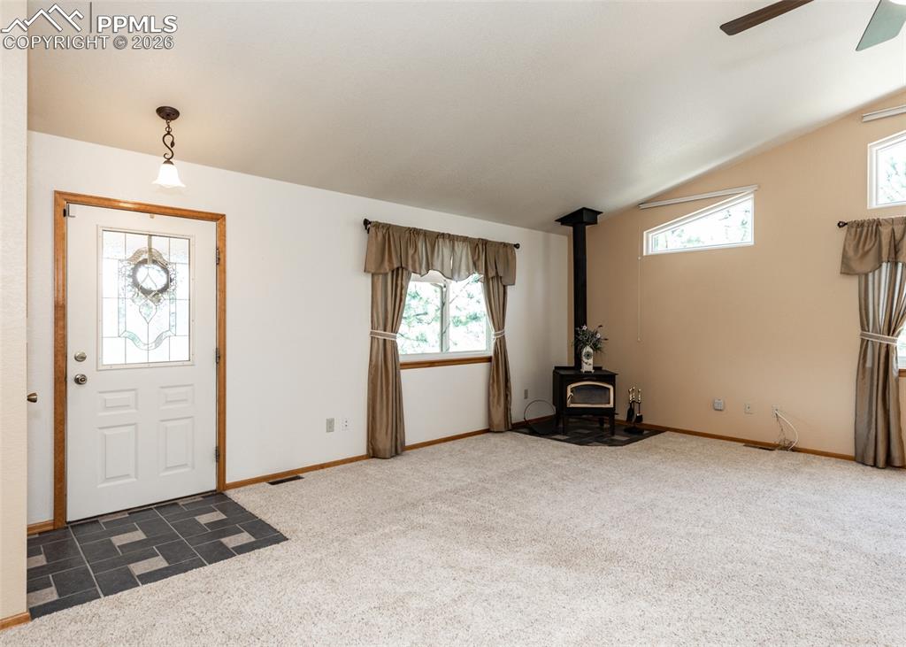 2602 Southpark Road Florissant, CO 80816 - Photo 14 of 50 Enter into the cozy living/family room.