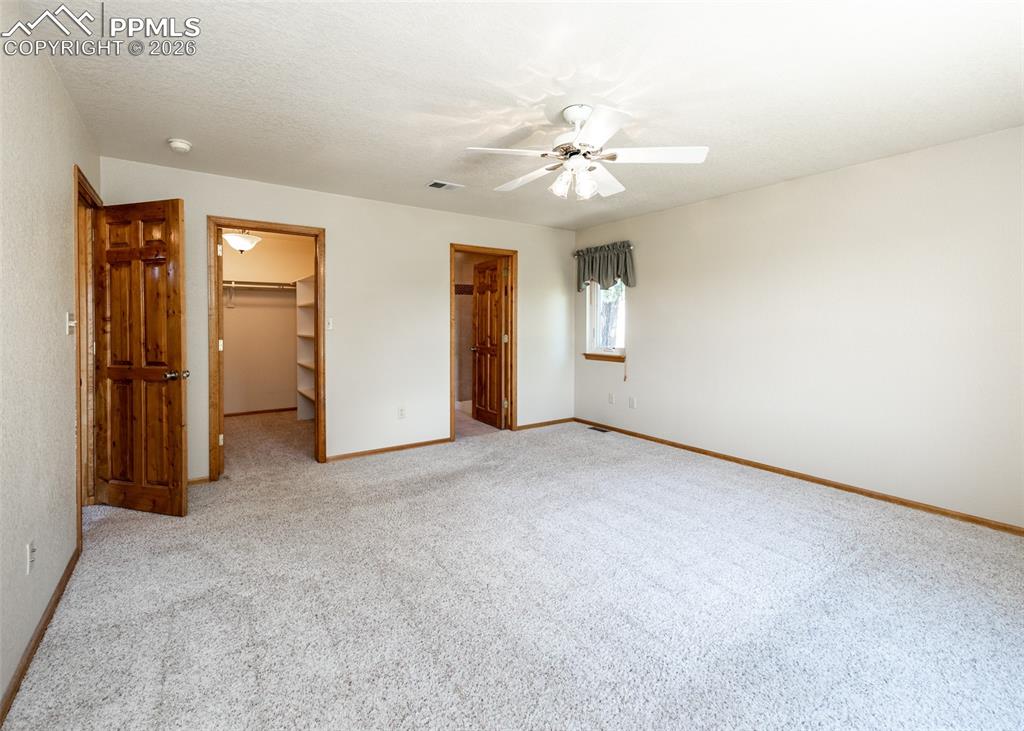 2602 Southpark Road Florissant, CO 80816 - Photo 26 of 50 Another view of the primary bedroom with walk-in closet and ensuite bath.