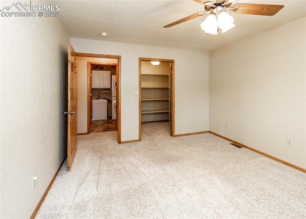 2602 Southpark Road Florissant, CO 80816 - Photo 35 of 50 This secondary bedroom (2) also has a walk-in closet! Perfect for an office or craft room.
