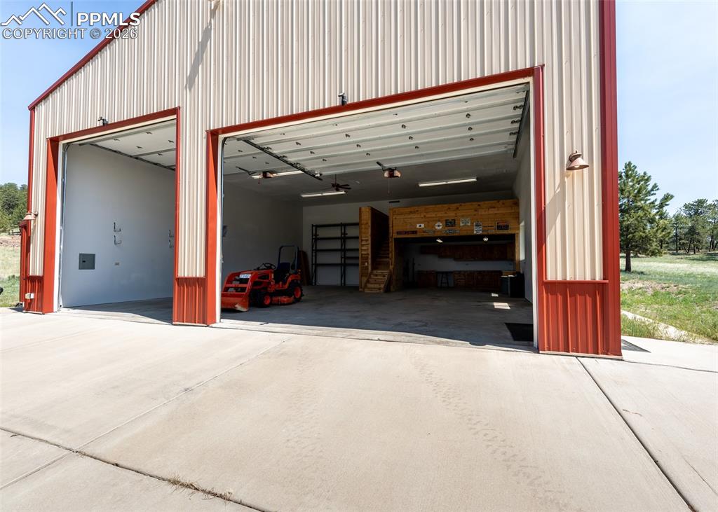 2602 Southpark Road Florissant, CO 80816 - Photo 5 of 50 14'x14', and 12'x18' auto-open garage doors will accommodate almost any situation!
