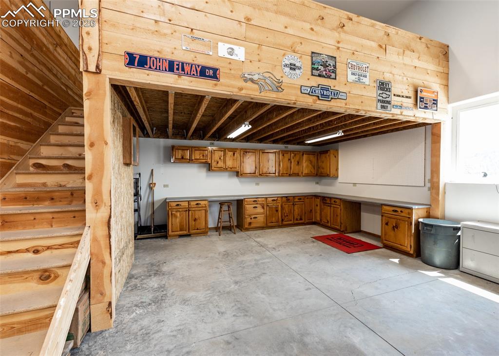 2602 Southpark Road Florissant, CO 80816 - Photo 8 of 50 Another view of all the storage/cabinetry and countertop space the workshop area!