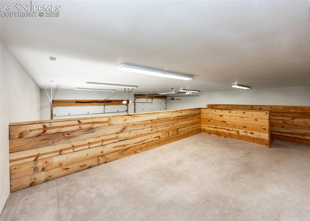 2602 Southpark Road Florissant, CO 80816 - Photo 9 of 50 Man cave loft above the workshop in the RV garage.
