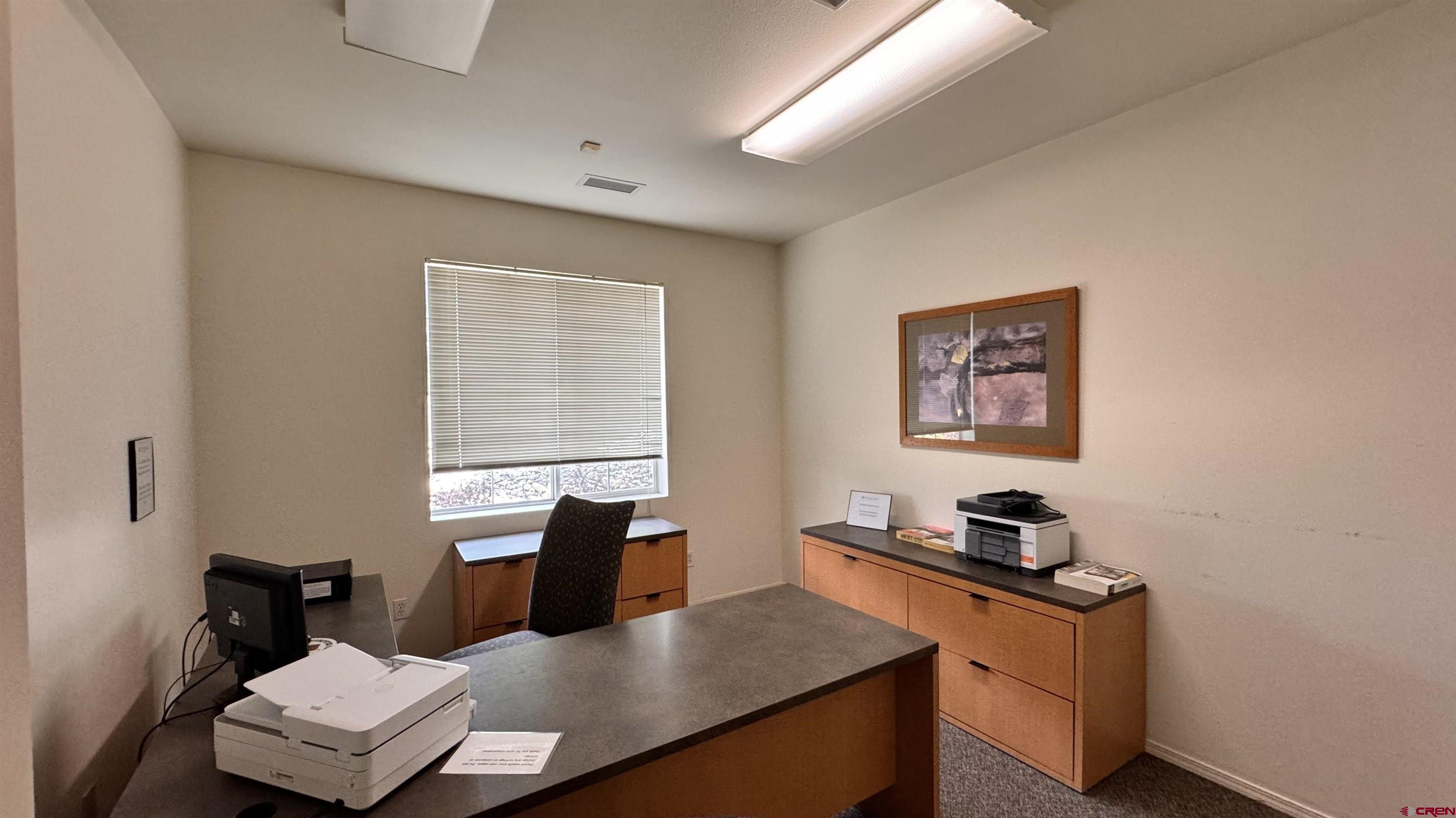 1100 Goeglein Gulch Road, Unit 204 Durango, CO 81301 - Photo 39 of 42 a work room with furniture and a window